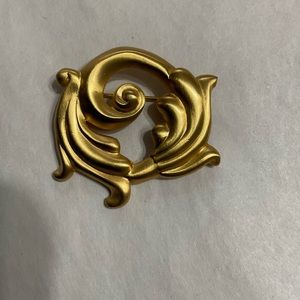 GOLD COLORED BROOCH